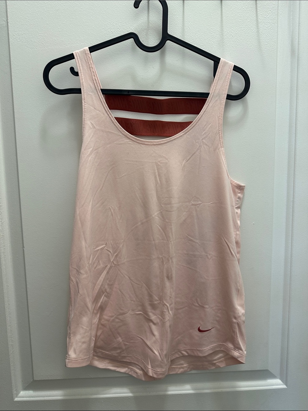 Nike Women's Pale Pink Athletic Tank Top with Coral Logo